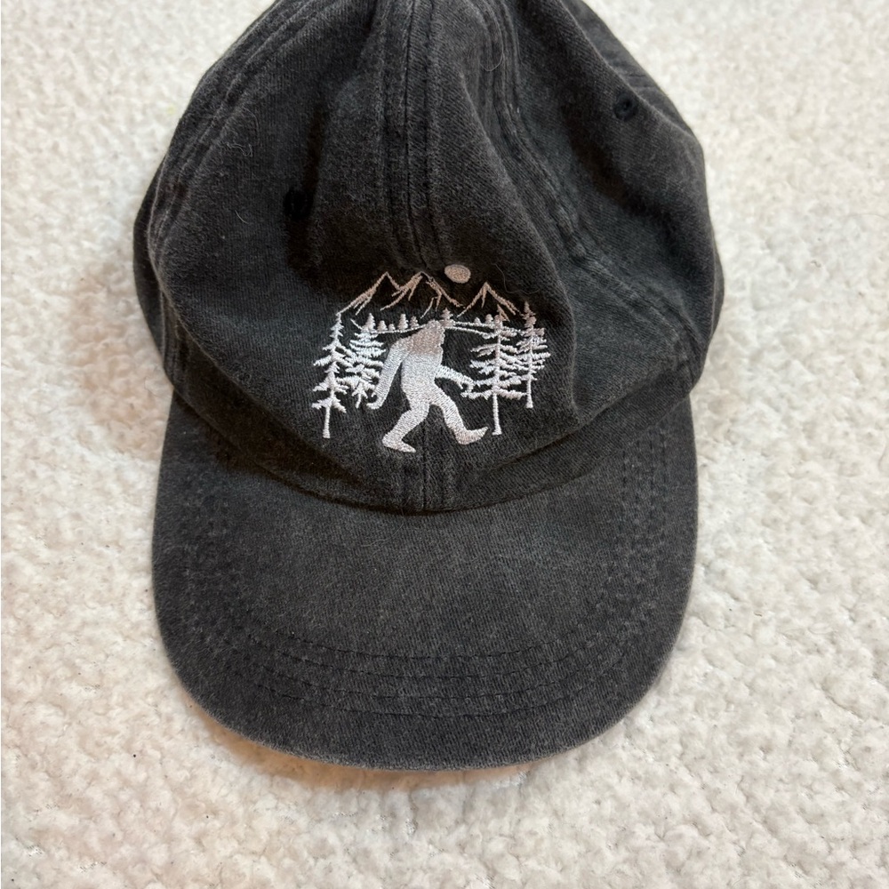 Black Cap with White Bigfoot/Trees/Mountains Embroidery